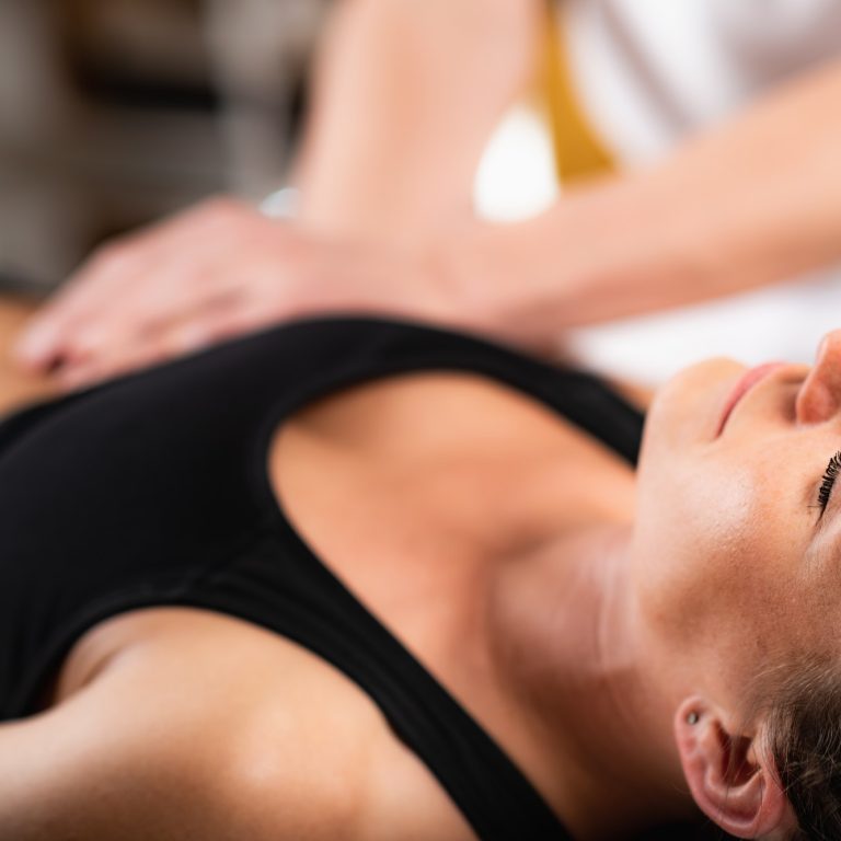 Chiropractor Working with Female Athlete