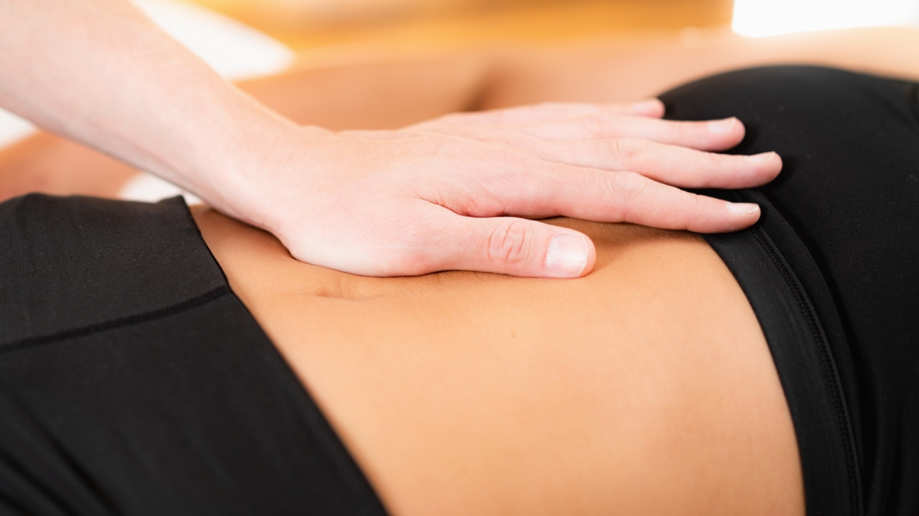 Chiropractor Working with Female Athlete