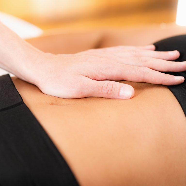 Chiropractor Working with Female Athlete